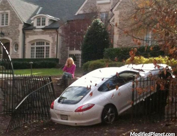 car-photo-2010-porsche-panamera-reverse-crash-into-gate-rich-people-fail.jpg