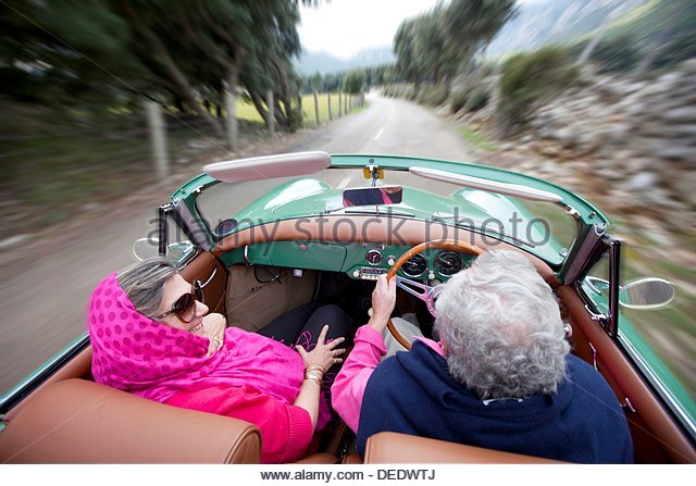 retired-couple-driving-their-classic-1959-porsche-356a-cabriolet-dedwtj.jpg